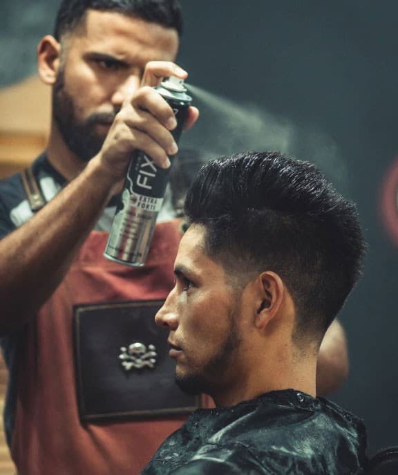 Finishing a scissor cut with water spray